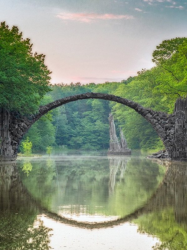 arch-bridge-in-kromlau-picture-id538162756.jpg