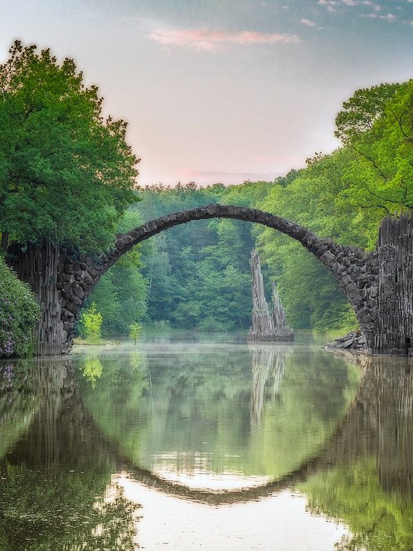 arch-bridge-in-kromlau-picture-id538162756.jpg